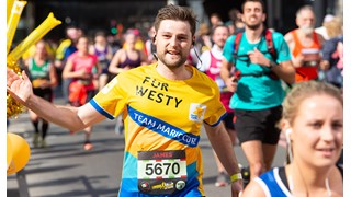 Runner in a yellow vest